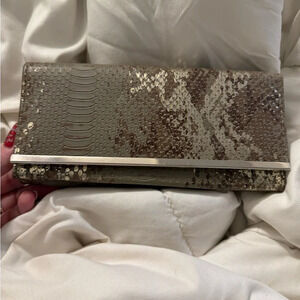 White House black market silver and gold wallet